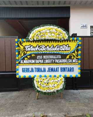 Papan Bunga Duka di Amar