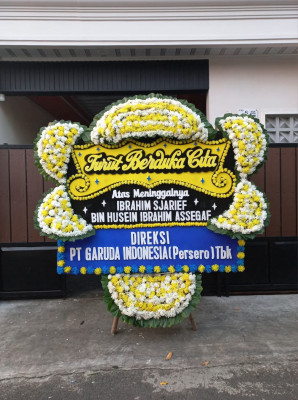Papan Bunga Duka di Amar
