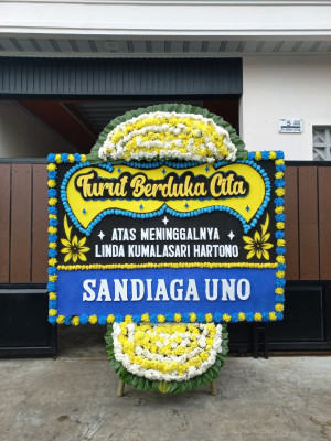 Papan Bunga Duka di Amar